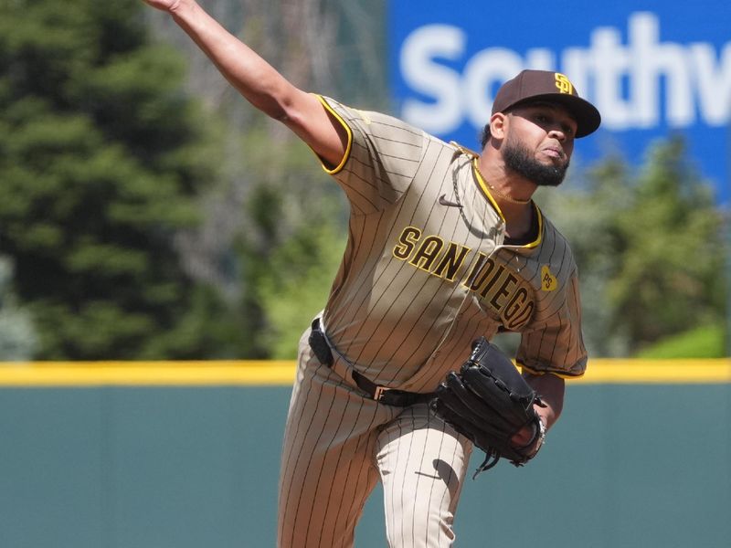 Apr 25, 2024; Denver, Colorado, USA; San Diego Padres starting pitcher Randy Vásquez (98) delivers a pitch in the first inning against the Colorado Rockies at Coors Field. Mandatory Credit: Ron Chenoy-USA TODAY Sports