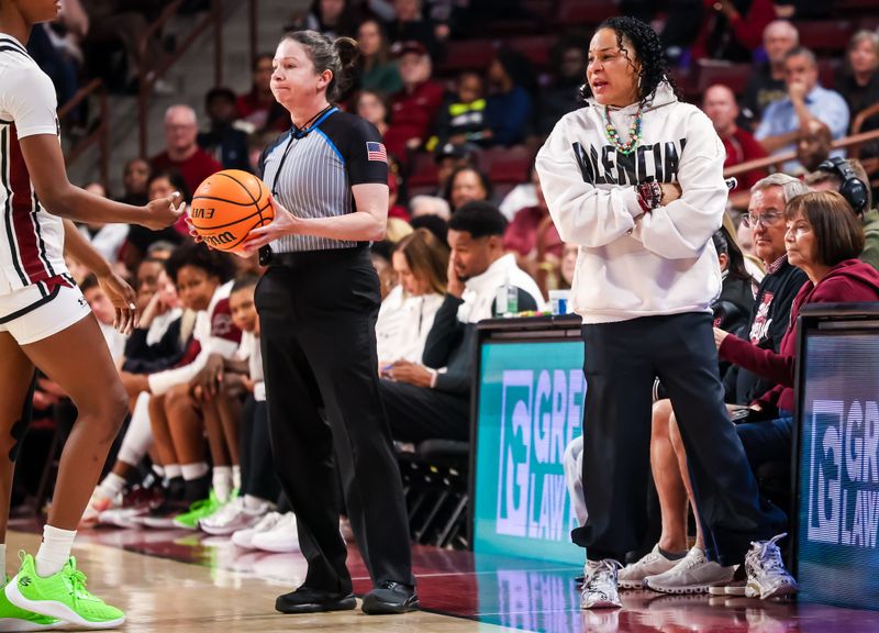 Dec 28, 2025; Columbia, South Carolina, USA; South Carolina Gamecocks head coach Dawn Staley directs her team against the Providence Friars in the first half at Colonial Life Arena. Mandatory Credit: Jeff Blake-Imagn Images