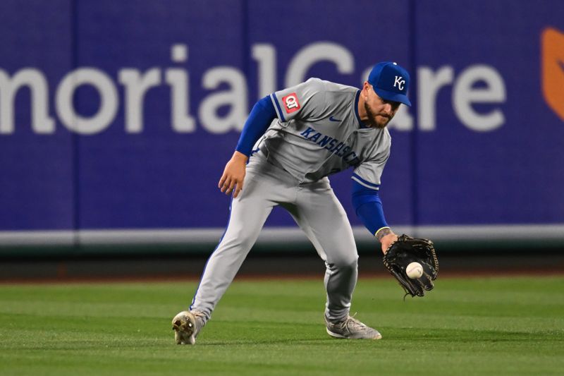 May 11, 2024; Anaheim, California, USA; Kansas City Royals outfielder Kyle Isbel (28) makes a catch against the Los Angeles Angels during the seventh inning at Angel Stadium. Mandatory Credit: Jonathan Hui-USA TODAY Sports