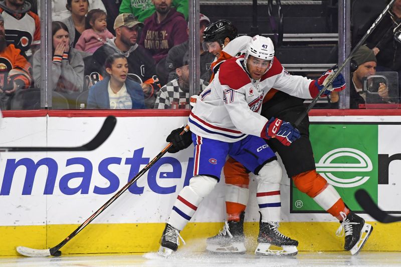 Oct 27, 2024; Philadelphia, Pennsylvania, USA; Montreal Canadiens defenseman Jayden Struble (47) checks Philadelphia Flyers right wing Tyson Foerster (71) during the second period at Wells Fargo Center. Mandatory Credit: Eric Hartline-Imagn Images