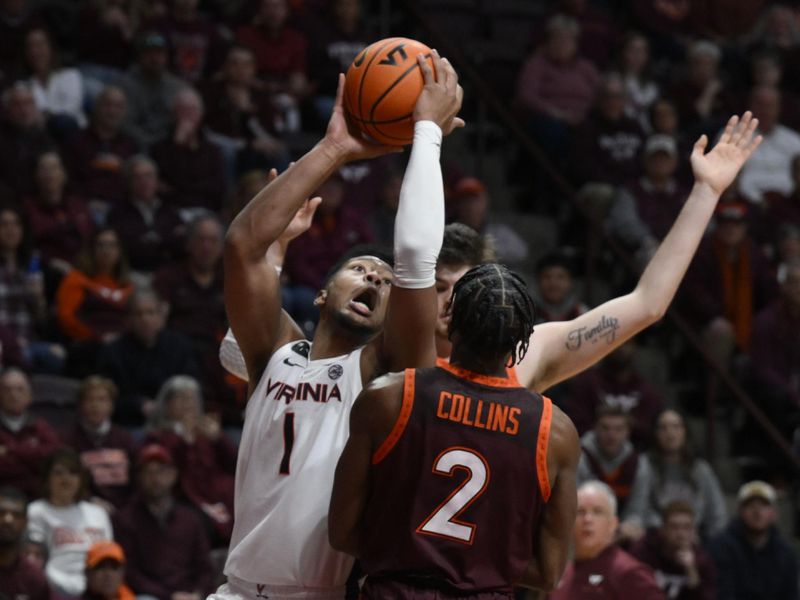 Feb 4, 2023; Blacksburg, Virginia, USA; Virginia Cavaliers forward Jayden Gardner (1) drives to basket as Virginia Tech Hokies guard Michael Collins Jr. (2) defends in the first half at Cassell Coliseum. Mandatory Credit: Lee Luther Jr.-USA TODAY Sports