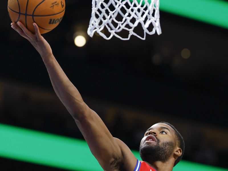 ATLANTA, GEORGIA - MARCH 23: Jared Butler #12 of the Philadelphia 76ers goes up for a shot during the first quarter against the Atlanta Hawks at State Farm Arena on March 23, 2025 in Atlanta, Georgia. NOTE TO USER: User expressly acknowledges and agrees that, by downloading and or using this photograph, User is consenting to the terms and conditions of the Getty Images License Agreement. (Photo by Todd Kirkland/Getty Images)