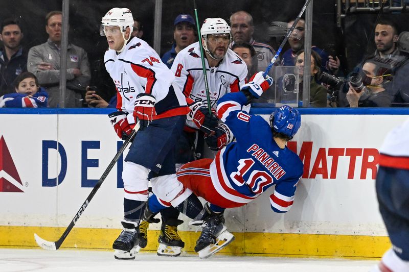 Apr 23, 2024; New York, New York, USA;  Washington Capitals left wing Alex Ovechkin (8) checks New York Rangers left wing Artemi Panarin (10) during the third period in game two of the first round of the 2024 Stanley Cup Playoffs at Madison Square Garden. Mandatory Credit: Dennis Schneidler-USA TODAY Sports