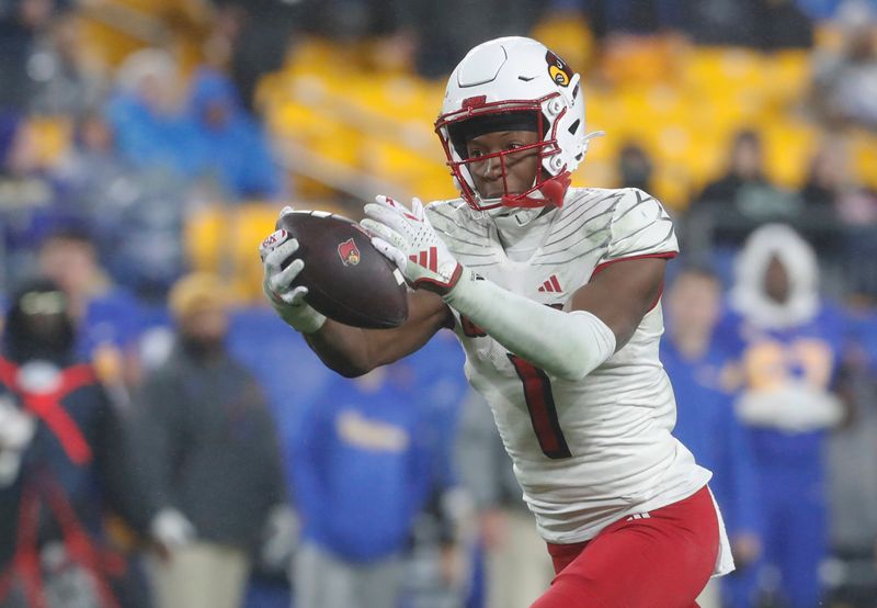 Oct 14, 2023; Pittsburgh, Pennsylvania, USA; Louisville Cardinals wide receiver Jamari Thrash (1) makes a catch against the Pittsburgh Panthers during the third quarter at Acrisure Stadium. Pittsburgh won 38-21. Mandatory Credit: Charles LeClaire-USA TODAY Sports