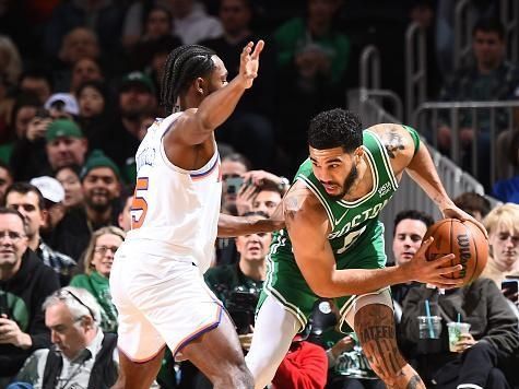 BOSTON, MA - DECEMBER 8: Immanuel Quickley #5 of the New York Knicks plays defense during the game  against Jayson Tatum #0 of the Boston Celtics on December 8, 2023 at the TD Garden in Boston, Massachusetts. NOTE TO USER: User expressly acknowledges and agrees that, by downloading and or using this photograph, User is consenting to the terms and conditions of the Getty Images License Agreement. Mandatory Copyright Notice: Copyright 2023 NBAE  (Photo by Brian Babineau/NBAE via Getty Images)