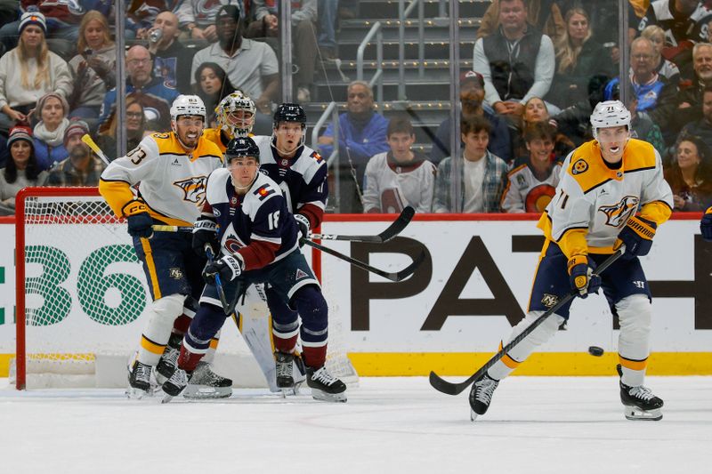Dec 13, 2025; Denver, Colorado, USA; Nashville Predators right wing Matthew Wood (71) watches a shot as Colorado Avalanche center Jack Drury (18) and center Parker Kelly (17) screen against goaltender Justus Annunen (29) as defenseman Adam Wilsby (83) defends in the third period at Ball Arena. Mandatory Credit: Isaiah J. Downing-Imagn Images