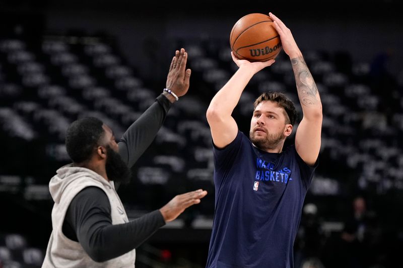 DALLAS, TEXAS - JANUARY 09: Luka Doncic #77 of the Dallas Mavericks warms up before the game against the Memphis Grizzlies at American Airlines Center on January 09, 2024 in Dallas, Texas. NOTE TO USER: User expressly acknowledges and agrees that, by downloading and or using this photograph, User is consenting to the terms and conditions of the Getty Images License Agreement. (Photo by Sam Hodde/Getty Images)