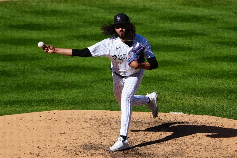 Oct 1, 2023; Denver, Colorado, USA; Colorado Rockies relief pitcher Justin Lawrence (61) delivers a pitch in the eighth inning against the Minnesota Twins at Coors Field. Mandatory Credit: Ron Chenoy-USA TODAY Sports