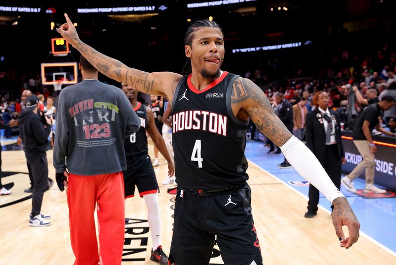 ATLANTA, GEORGIA - JANUARY 28:  Jalen Green #4 of the Houston Rockets reacts after their 100-96 win over the Atlanta Hawks at State Farm Arena on January 28, 2025 in Atlanta, Georgia.  NOTE TO USER: User expressly acknowledges and agrees that, by downloading and/or using this photograph, user is consenting to the terms and conditions of the Getty Images License Agreement.  (Photo by Kevin C. Cox/Getty Images)