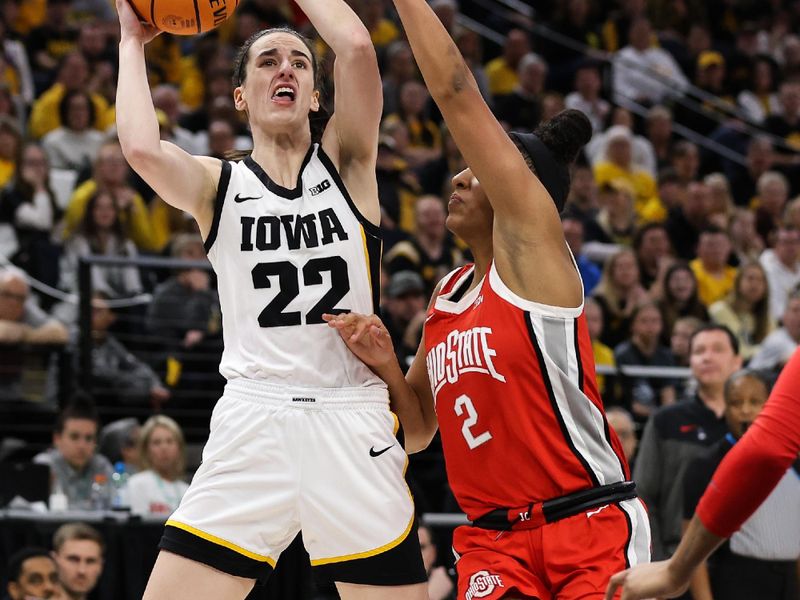 Mar 5, 2023; Minneapolis, MINN, USA; Iowa Hawkeyes guard Caitlin Clark (22) shoots while Ohio State Buckeyes forward Taylor Thierry (2) defends during the first half at Target Center. Mandatory Credit: Matt Krohn-USA TODAY Sports