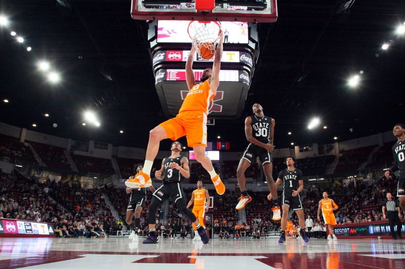 Jan 17, 2023; Starkville, Mississippi, USA; Tennessee Volunteers forward Uros Plavsic (33) dunks during the first half  against the Mississippi State Bulldogs at Humphrey Coliseum. Mandatory Credit: Petre Thomas-USA TODAY Sports