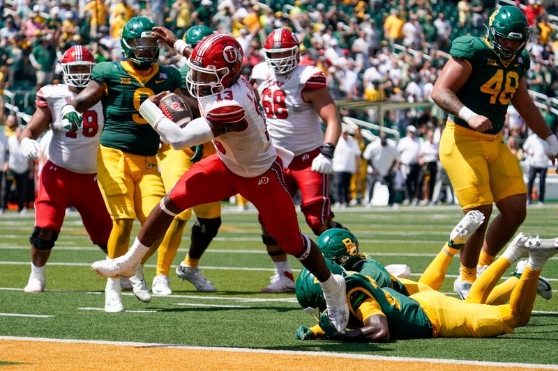 Sep 9, 2023; Waco, Texas, USA; Utah Utes quarterback Nate Johnson (13) carries the ball for a 11-yard touchdown against the Baylor Bears during the second half at McLane Stadium. Mandatory Credit: Raymond Carlin III-USA TODAY Sports