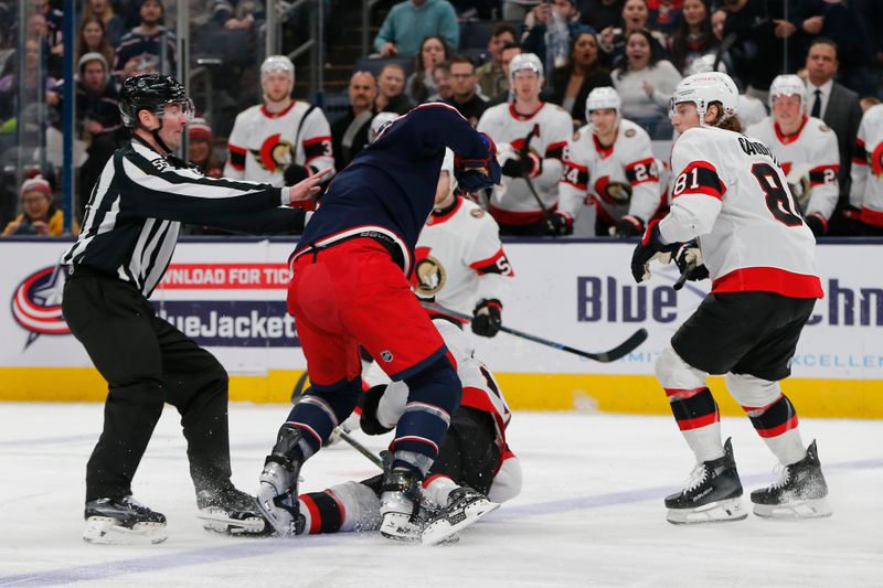 Apr 8, 2025; Columbus, Ohio, USA; Columbus Blue Jackets center Sean Kuraly (7) and Ottawa Senators center Matthew Highmore (15) draw roughing penalties after an altercation during the second period at Nationwide Arena. Mandatory Credit: Russell LaBounty-Imagn Images