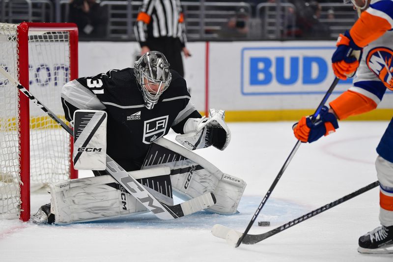 Mar 11, 2024; Los Angeles, California, USA; Los Angeles Kings goaltender David Rittich (31) defends the goal against the New York Islanders during the first period at Crypto.com Arena. Mandatory Credit: Gary A. Vasquez-USA TODAY Sports