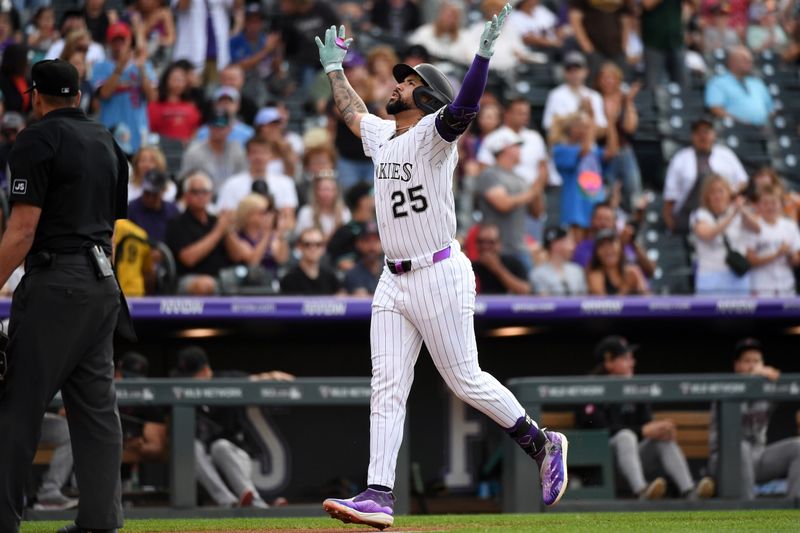 Aug 16, 2025; Denver, Colorado, USA; Colorado Rockies first baseman Warming Bernabel (25) celebrates after a home run during the second inning against the Arizona Diamondbacks at Coors Field. Mandatory Credit: Christopher Hanewinckel-Imagn Images