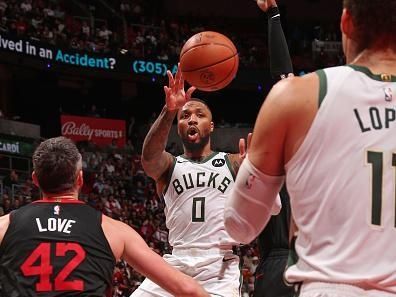 MIAMI, FL - NOVEMBER 28: Damian Lillard #0 of the Milwaukee Bucks passes the ball during the game against the Miami Heat during the In-Season Tournament on November 28, 2023 at Kaseya Center in Miami, Florida. NOTE TO USER: User expressly acknowledges and agrees that, by downloading and or using this Photograph, user is consenting to the terms and conditions of the Getty Images License Agreement. Mandatory Copyright Notice: Copyright 2023 NBAE (Photo by Issac Baldizon/NBAE via Getty Images)