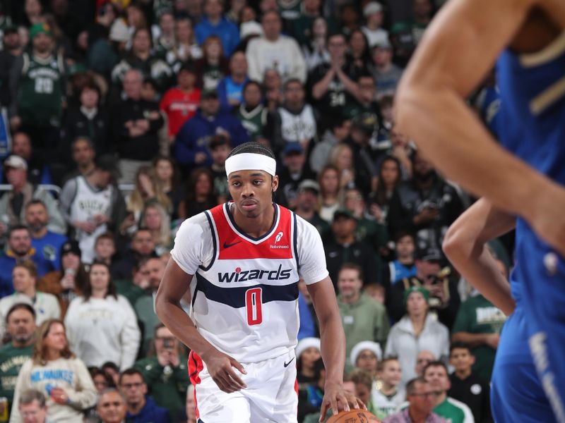 MILWAUKEE, WI - NOVEMBER 30: Bilal Coulibaly #0 of the Washington Wizards dribbles the ball during the game against the Milwaukee Bucks on November 30, 2024 at Fiserv Forum Center in Milwaukee, Wisconsin. NOTE TO USER: User expressly acknowledges and agrees that, by downloading and or using this Photograph, user is consenting to the terms and conditions of the Getty Images License Agreement. Mandatory Copyright Notice: Copyright 2024 NBAE (Photo by Gary Dineen/NBAE via Getty Images).