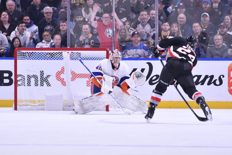 Oct 21, 2023; Buffalo, New York, USA; New York Islanders goaltender Semyon Varlamov (40) prepares to defend a shot by Buffalo Sabres center Dylan Cozens (24) in the first period at KeyBank Center. Mandatory Credit: Mark Konezny-USA TODAY Sports