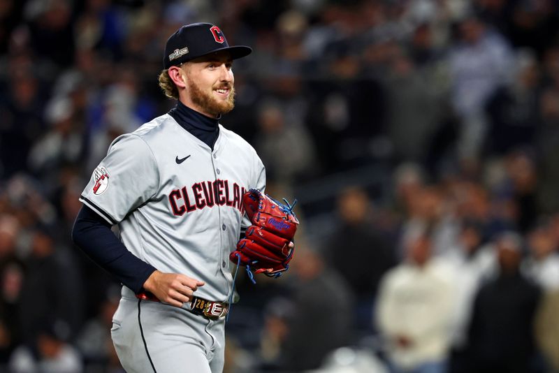 Oct 15, 2024; Bronx, New York, USA; Cleveland Guardians pitcher Tanner Bibee (28) leaves the field after being relieved during the second inning against the New York Yankees in game two of the ALCS for the 2024 MLB Playoffs at Yankee Stadium. Mandatory Credit: Vincent Carchietta-Imagn Images