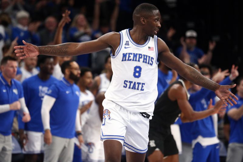 Jan 31, 2024; Memphis, Tennessee, USA; Memphis Tigers forward David Jones (8) reacts during the second half against the Rice Owls at FedExForum. Mandatory Credit: Petre Thomas-USA TODAY Sports