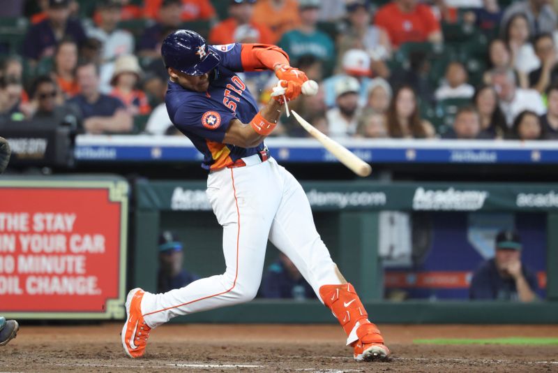 May 25, 2025; Houston, Texas, USA; Houston Astros right fielder Cam Smith (11) breaks his bat on a pop fly during the fourth inning against the Seattle Mariners at Daikin Park. Mandatory Credit: Troy Taormina-Imagn Images
