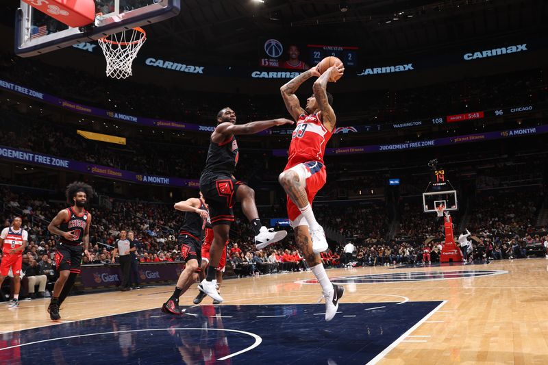 WASHINGTON, DC -? JANUARY 1: Kyle Kuzma #33 of the Washington Wizards drives to the basket during the game against the Chicago Bulls on January 1, 2025 at Capital One Arena in Washington, DC. NOTE TO USER: User expressly acknowledges and agrees that, by downloading and or using this Photograph, user is consenting to the terms and conditions of the Getty Images License Agreement. Mandatory Copyright Notice: Copyright 2025 NBAE (Photo by Kenny Giarla/NBAE via Getty Images)