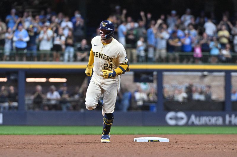 Aug 28, 2024; Milwaukee, Wisconsin, USA; Milwaukee Brewers catcher William Contreras (24) rounds the bases after hitting a home run against the San Francisco Giants in the fifth inning at American Family Field. Mandatory Credit: Michael McLoone-USA TODAY Sports