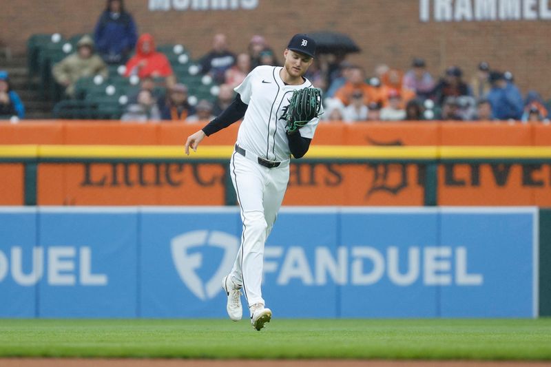 Sep 28, 2024; Detroit, Michigan, USA; Detroit Tigers outfielder Parker Meadows (22) catches a fly ball hit by Chicago White Sox outfielder Miguel Vargas (20) during the first inning of the game at Comerica Park. Mandatory Credit: Brian Bradshaw Sevald-Imagn Images