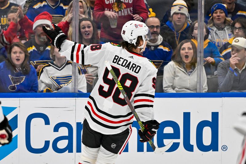 Dec 23, 2023; St. Louis, Missouri, USA;  Chicago Blackhawks center Connor Bedard (98) reacts after scoring against the St. Louis Blues during the first period at Enterprise Center. Mandatory Credit: Jeff Curry-USA TODAY Sports