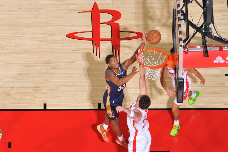 HOUSTON, TX - OCTOBER 15:  Malcolm Hill #33 of the New Orleans Pelicans dunks the ball during the game against the Houston Rockets during a NBA preseason game on October 15, 2024 at the Toyota Center in Houston, Texas. NOTE TO USER: User expressly acknowledges and agrees that, by downloading and or using this photograph, User is consenting to the terms and conditions of the Getty Images License Agreement. Mandatory Copyright Notice: Copyright 2024 NBAE (Photo by Logan Riely/NBAE via Getty Images)