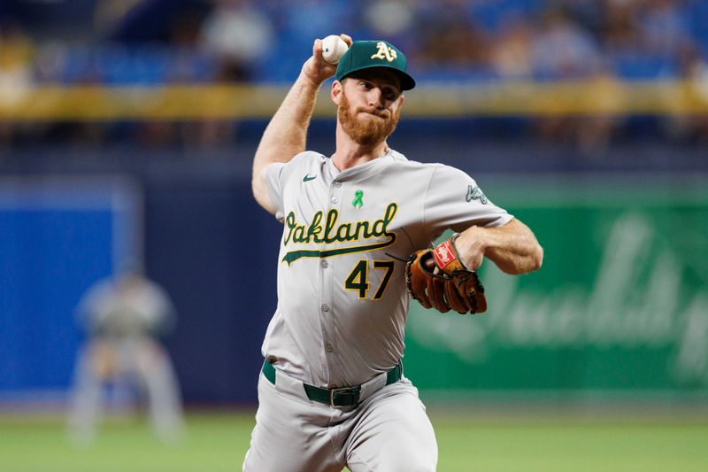 May 28, 2024; St. Petersburg, Florida, USA;  Oakland Athletics pitcher Michael Kelly (47) throws a pitch against the Tampa Bay Rays in the seventh inning at Tropicana Field. Mandatory Credit: Nathan Ray Seebeck-USA TODAY Sports