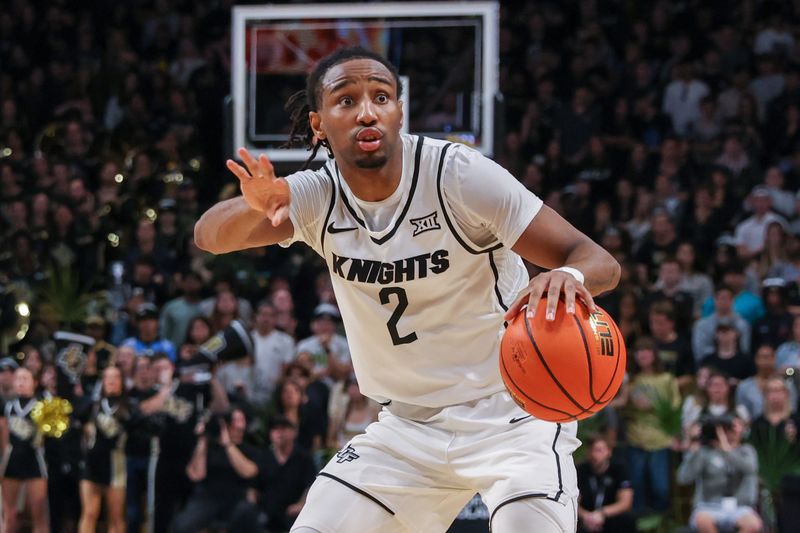 Jan 13, 2024; Orlando, Florida, USA; UCF Knights guard Shemarri Allen (2) signals to teammates during the second half against the Brigham Young Cougars at Addition Financial Arena. Mandatory Credit: Mike Watters-USA TODAY Sports