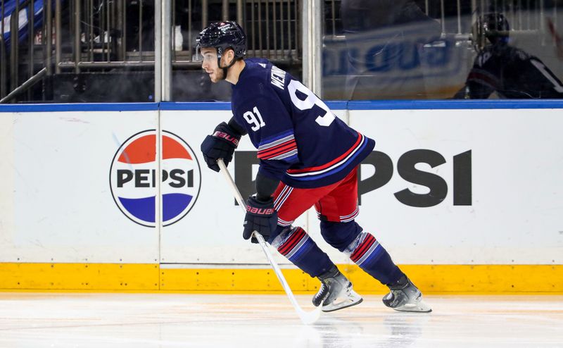 Mar 9, 2024; New York, New York, USA: New York Rangers center Alex Wennberg (91) skates against the St. Louis Blues during the first period at Madison Square Garden. Mandatory Credit: Danny Wild-USA TODAY Sports