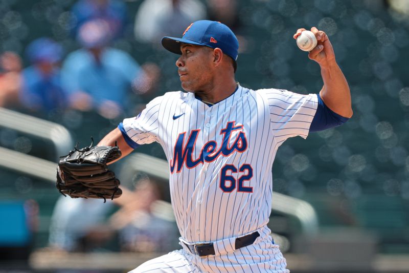 Jul 14, 2024; New York City, New York, USA; New York Mets starting pitcher Jose Quintana (62) delivers a pitch during the first inning against the Colorado Rockies at Citi Field. Mandatory Credit: Vincent Carchietta-USA TODAY Sports