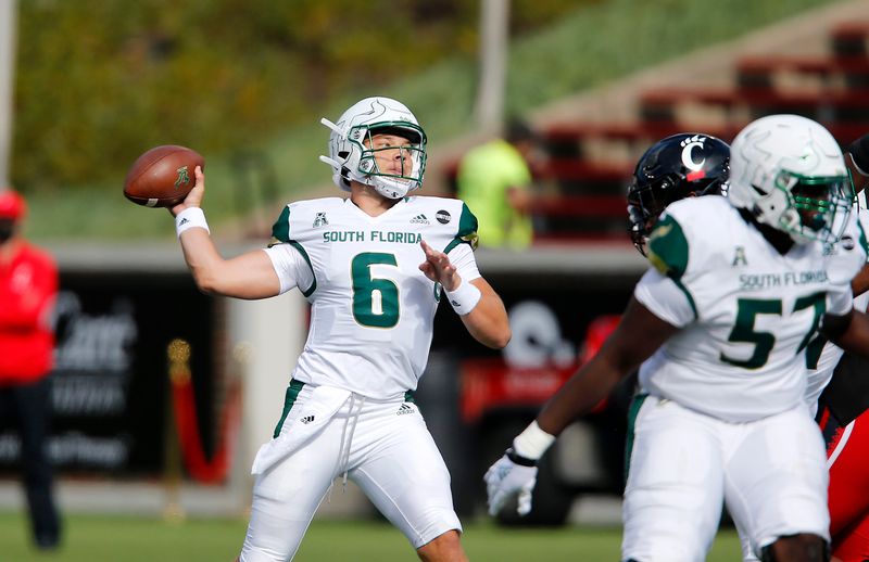 Oct 3, 2020; Cincinnati, OH, USA; South Florida Bulls quarterback Cade Fortin (6) drops to throw during the first quarter against the Cincinnati Bearcats at Nippert Stadium. Mandatory Credit: Joseph Maiorana-USA TODAY Sports