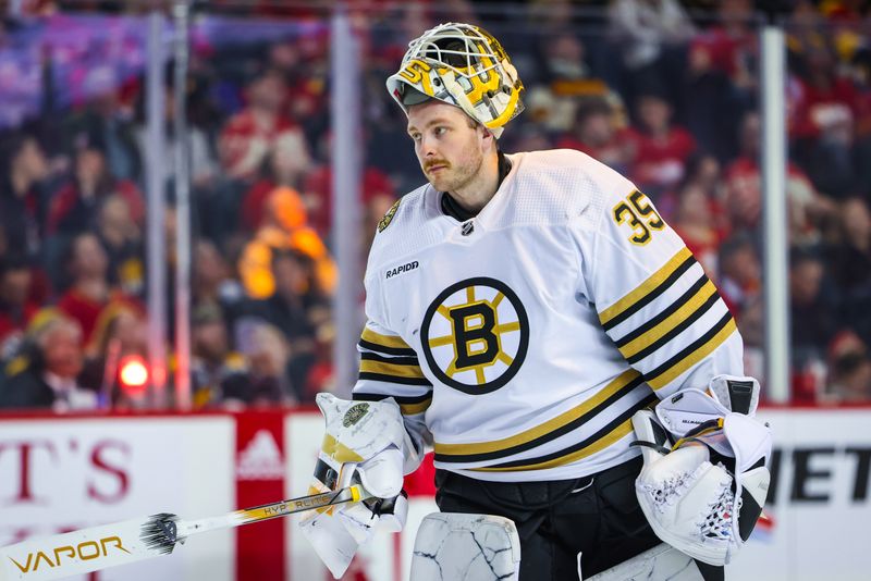 Feb 22, 2024; Calgary, Alberta, CAN; Boston Bruins goaltender Linus Ullmark (35) against the Calgary Flames during the second period at Scotiabank Saddledome. Mandatory Credit: Sergei Belski-USA TODAY Sports