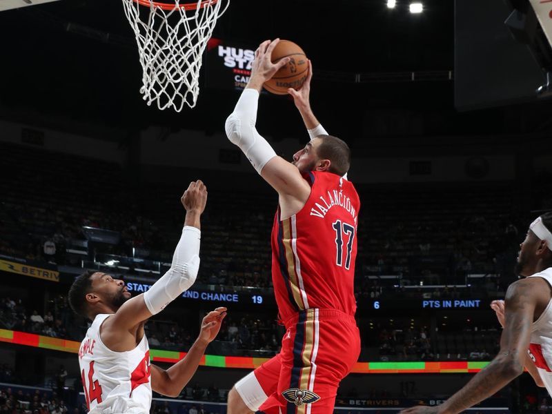 NEW ORLEANS, LA - FEBRUARY 5: Jonas Valanciunas #17 of the New Orleans Pelicans drives to the basket during the game against the Toronto Raptors on February 5, 2024 at the Smoothie King Center in New Orleans, Louisiana. NOTE TO USER: User expressly acknowledges and agrees that, by downloading and or using this Photograph, user is consenting to the terms and conditions of the Getty Images License Agreement. Mandatory Copyright Notice: Copyright 2024 NBAE (Photo by Layne Murdoch Jr./NBAE via Getty Images)
