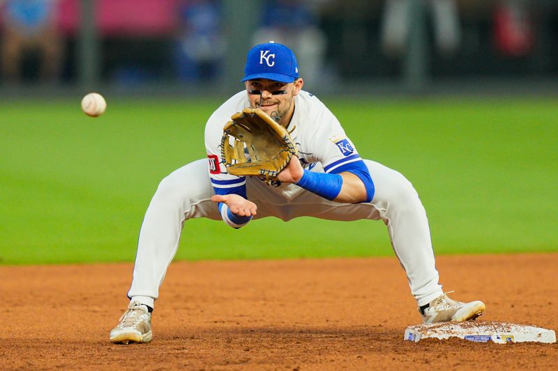 Sep 4, 2025; Kansas City, Missouri, USA; Kansas City Royals second baseman Michael Massey (19) catches the ball during the fourth inning against the Los Angeles Angels at Kauffman Stadium. Mandatory Credit: Jay Biggerstaff-Imagn Images
