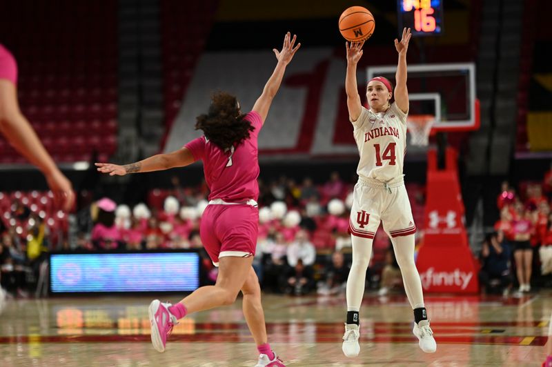 Jan 31, 2024; College Park, Maryland, USA; Indiana Hoosiers guard Sara Scalia (14) shoots a three point basket over Maryland Terrapins guard Lavender Briggs (3) during the first half  at Xfinity Center. Mandatory Credit: Tommy Gilligan-USA TODAY Sports