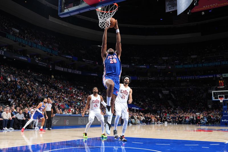 PHILADELPHIA, PA - NOVEMBER 13: Guerschon Yabusele #28 of the Philadelphia 76ers dunks the ball during the game against the Cleveland Cavaliers on November 13, 2024 at the Wells Fargo Center in Philadelphia, Pennsylvania NOTE TO USER: User expressly acknowledges and agrees that, by downloading and/or using this Photograph, user is consenting to the terms and conditions of the Getty Images License Agreement. Mandatory Copyright Notice: Copyright 2024 NBAE (Photo by Jesse D. Garrabrant/NBAE via Getty Images)