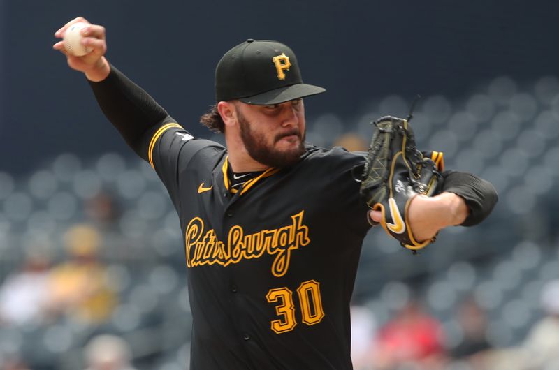 May 1, 2025; Pittsburgh, Pennsylvania, USA; Pittsburgh Pirates starting pitcher Paul Skenes (30) pitches against the Chicago Cubs during the fourth inning at PNC Park. Mandatory Credit: Charles LeClaire-Imagn Images