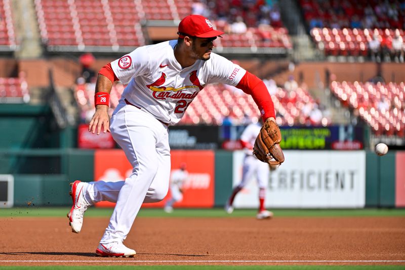 Aug 5, 2024; St. Louis, Missouri, USA;  St. Louis Cardinals third baseman Nolan Arenado (28) fields a ground ball against the New York Mets during the first inning at Busch Stadium. Mandatory Credit: Jeff Curry-USA TODAY Sports