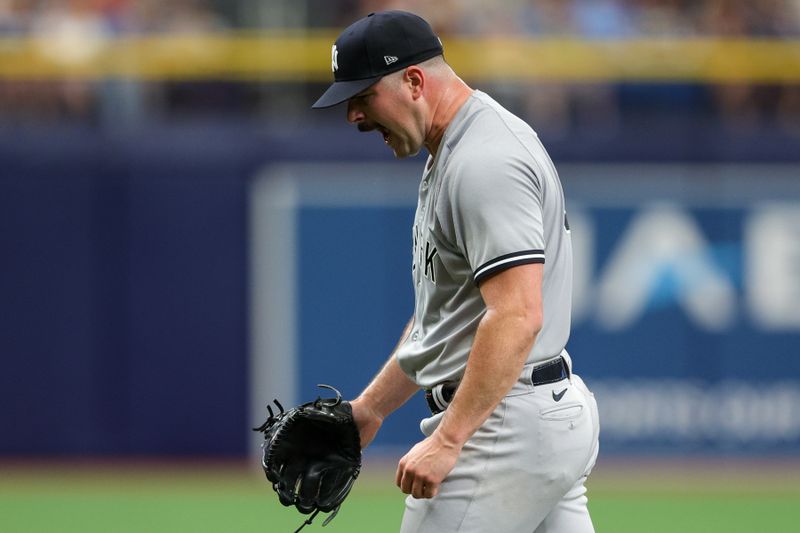 Aug 27, 2023; St. Petersburg, Florida, USA;  New York Yankees starting pitcher Carlos Rodon (55) reacts after pitching against the Tampa Bay Rays in the first inning at Tropicana Field. Mandatory Credit: Nathan Ray Seebeck-USA TODAY Sports