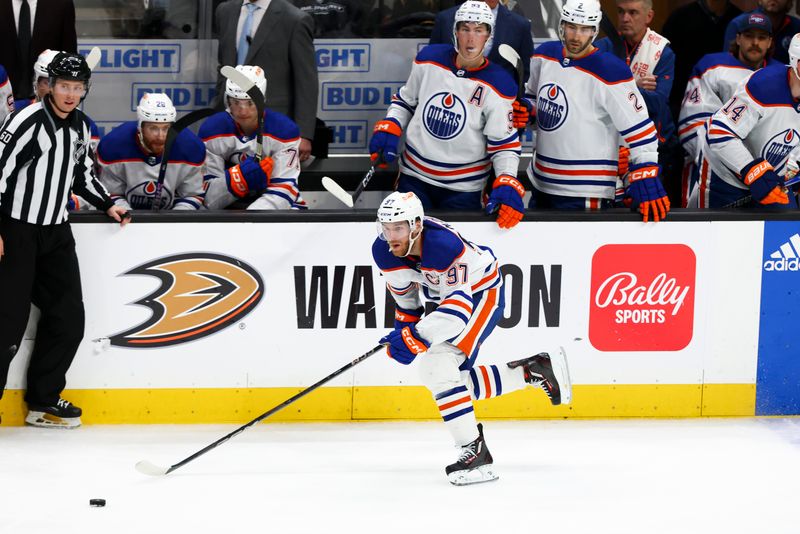 Feb 9, 2024; Anaheim, California, USA; Edmonton Oilers center Connor McDavid (97) skates with the puck during against the Anaheim Ducks during the third period of a game at Honda Center. Mandatory Credit: Jessica Alcheh-USA TODAY Sports