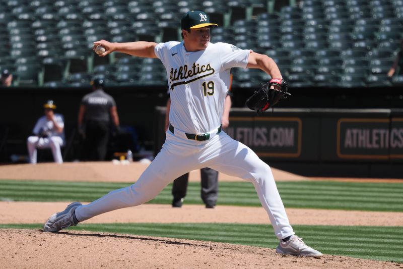 May 1, 2024; Oakland, California, USA; Oakland Athletics relief pitcher Mason Miller (19) pitches the ball against the Pittsburgh Pirates during the ninth inning at Oakland-Alameda County Coliseum. Mandatory Credit: Kelley L Cox-USA TODAY Sports