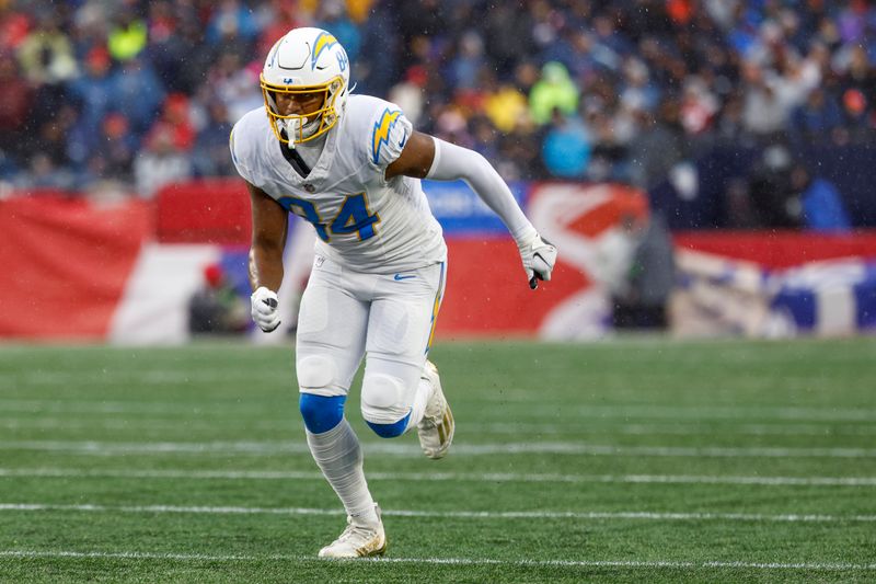 Los Angeles Chargers tight end Stone Smartt (84) runs a route during the first half of an NFL football game against the New England Patriots on Sunday, Dec. 3, 2023, in Foxborough, Mass. (AP Photo/Greg M. Cooper)