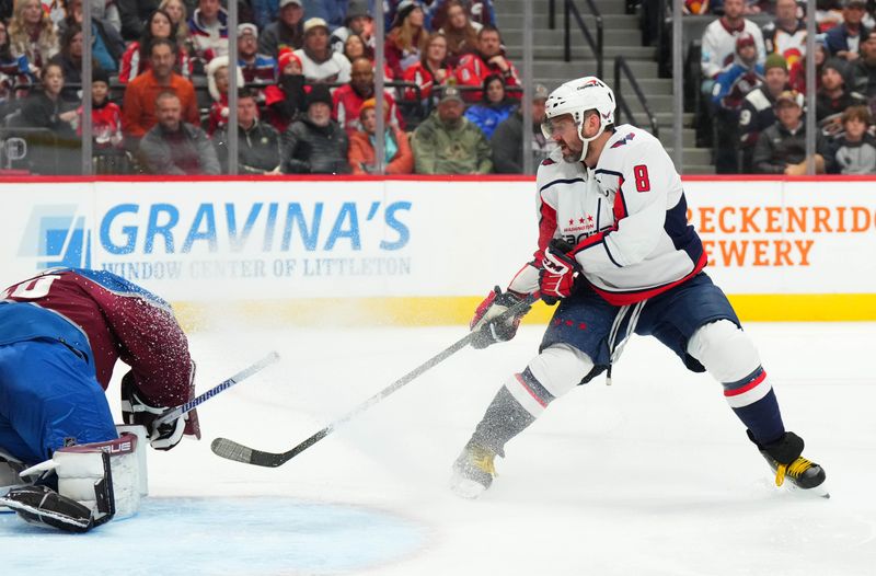 Jan 24, 2023; Denver, Colorado, USA; Washington Capitals left wing Alex Ovechkin (8) is unable to score on Colorado Avalanche goaltender Alexandar Georgiev (40) in the third period at Ball Arena. Mandatory Credit: Ron Chenoy-USA TODAY Sports