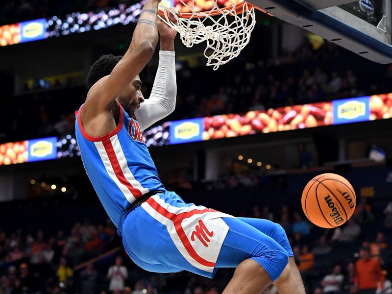 Mar 9, 2023; Nashville, TN, USA; Mississippi Rebels forward Myles Burns (3) dunks the ball during the second half against the Tennessee Volunteers at Bridgestone Arena. Mandatory Credit: Christopher Hanewinckel-USA TODAY Sports