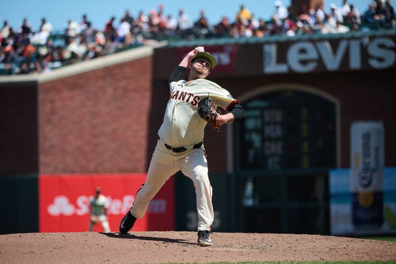 May 19, 2024; San Francisco, California, USA; San Francisco Giants pitcher Luke Jackson (77) throws a pitch against the Colorado Rockies during the seventh inning at Oracle Park. Mandatory Credit: Robert Edwards-USA TODAY Sports