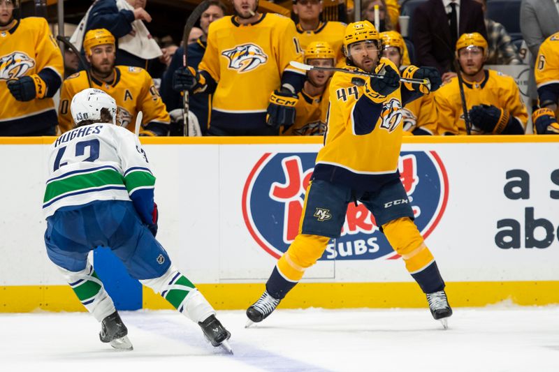 Apr 28, 2024; Nashville, Tennessee, USA; Nashville Predators left wing Kiefer Sherwood (44) blocks the puck against the Vancouver Canucks during the second period in game four of the first round of the 2024 Stanley Cup Playoffs at Bridgestone Arena. Mandatory Credit: Steve Roberts-USA TODAY Sports